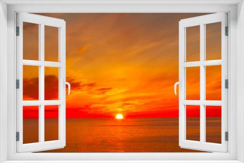 Fototapeta Naklejka Na Ścianę Okno 3D - Beautiful Orange and Yellow Golden Hour Sunset over the Ocean