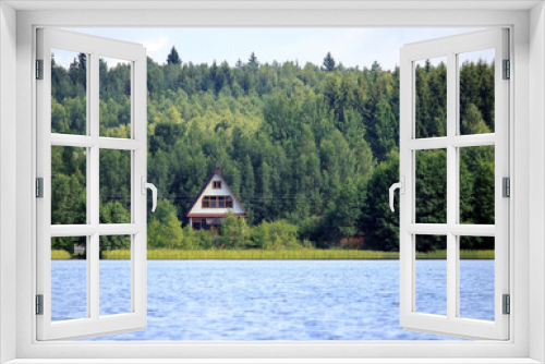 Fototapeta Naklejka Na Ścianę Okno 3D - lake house in the forest