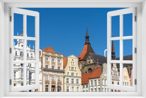 Fototapeta Naklejka Na Ścianę Okno 3D - view of the houses at the Neuer Markt Square in Rostock