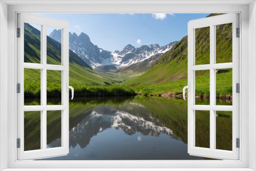 Fototapeta Naklejka Na Ścianę Okno 3D - Reflection of Chauki  mountain in Juta valley, Caucasus mountain range in summer season, Georgia