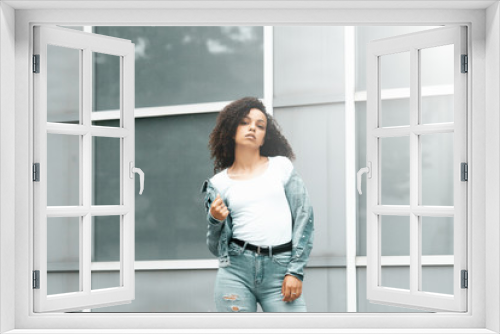 black curly girl on street