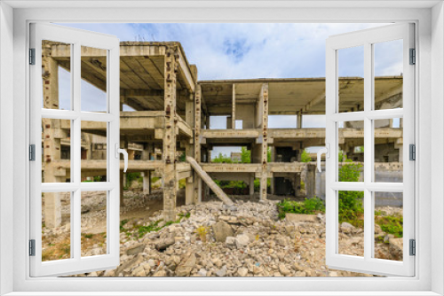 Fototapeta Naklejka Na Ścianę Okno 3D - Building of an industrial complex in degradation