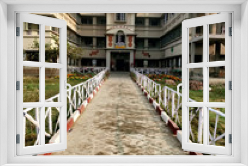 Fototapeta Naklejka Na Ścianę Okno 3D - Wide angle shot of the Vivekananda Shiksha Niketan building at Joygopalpur in West Bengal state in India- 9th Feb 2018
