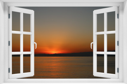 Fototapeta Naklejka Na Ścianę Okno 3D - 江ノ島海岸から見る伊豆半島に沈む太陽

