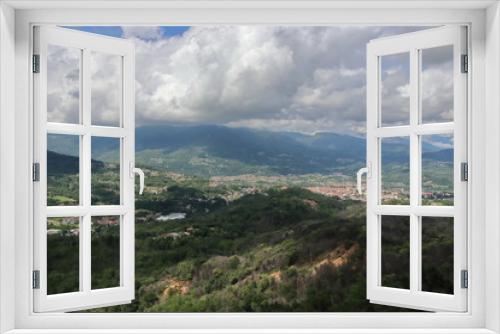 Fototapeta Naklejka Na Ścianę Okno 3D - A view of the Canvese hills and mountains from the Sacro Monte di Belmonte sanctuary in the province of Turin. 