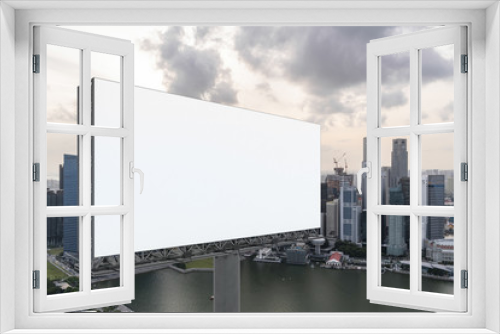 Fototapeta Naklejka Na Ścianę Okno 3D - Blank white road billboard with Singapore cityscape background at sunset. Street advertising poster, mock up, 3D rendering. Side view. The concept of marketing communication to sell idea.