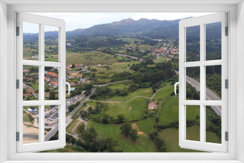Fototapeta Naklejka Na Ścianę Okno 3D - Road in landscape of Colunga, Asturias,Spain. Aerial Drone Photo