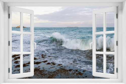 Fototapeta Naklejka Na Ścianę Okno 3D - Big high tide and big waves on the Chaussée du Sillon in Saint Malo, Brittany, France