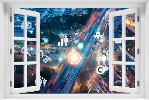 Fototapeta Naklejka Na Ścianę Okno 3D - Research and development hologram on aerial view of road, busy urban traffic highway at night. Junction network of transportation infrastructure. Concept of innovative logistics. Double exposure.