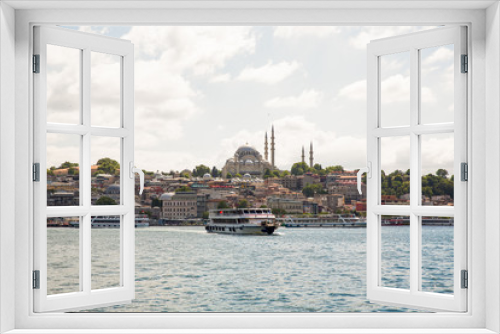 Fototapeta Naklejka Na Ścianę Okno 3D - Panoramic shot of the old town Istanbul; The Hagia Sophia (Ayasofya) Mosque Eminonu, ferries and boats on the Golden Horn, Istanbul, Turkey.