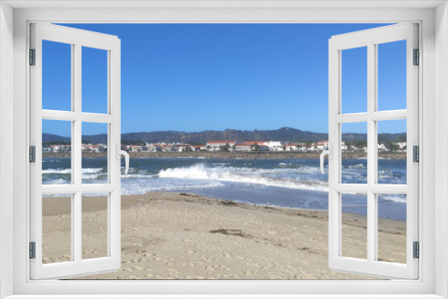 Fototapeta Naklejka Na Ścianę Okno 3D - Waves of water of the river and the sea meet each other during high tide and low tide. Whirlpools of the Cavado River in Esposende, Portugal.