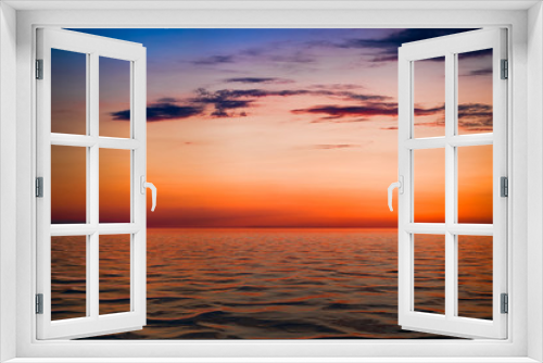 Fototapeta Naklejka Na Ścianę Okno 3D - bright sunset over the blue sea