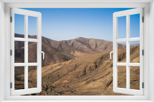 Fototapeta Naklejka Na Ścianę Okno 3D - View of the mountain landscape from the Risco de las Penas viewpoint. Fuerteventura. Canary Islands. Spain.