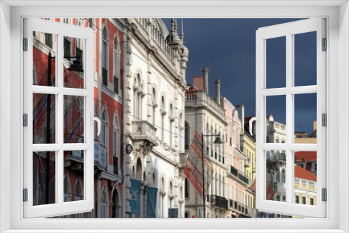 Fototapeta Naklejka Na Ścianę Okno 3D - colorful streets with majestic facades, windows and balconies of Lisbon city in Portugal