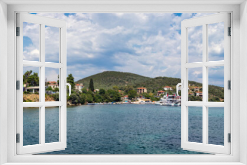 Fototapeta Naklejka Na Ścianę Okno 3D - Panoramic view of a small beach and port Mitzela, Amaliapoli, Greece.