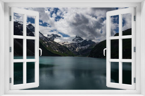 Fototapeta Naklejka Na Ścianę Okno 3D - Scenic view on Mooserboden See near Kaprun, Austria, Europe. National park Hohe Tauern. Charming lake with amazing deep colorful water and glaciers above it. Favourite destination for holidays.