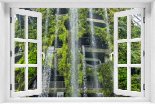 Fototapeta Naklejka Na Ścianę Okno 3D - The Falls in the Cloud Forest greenhouse at Marina Bay - Singapore