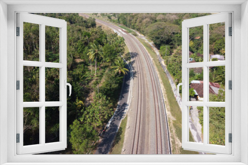 Fototapeta Naklejka Na Ścianę Okno 3D - aerial view of railroad tracks across the countryside