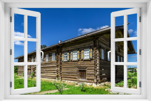 Fototapeta Naklejka Na Ścianę Okno 3D - wooden country house Mandrogi Russia.