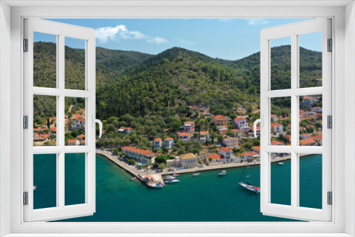 Fototapeta Naklejka Na Ścianę Okno 3D - Aerial drone panoramic photo of picturesque village capital and port of Ithaki or Ithaca island called Vathi a safe anchoring for sail boats, Ionian, Greece