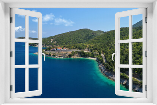 Fototapeta Naklejka Na Ścianę Okno 3D - Aerial drone panoramic photo of picturesque village capital and port of Ithaki or Ithaca island called Vathi a safe anchoring for sail boats, Ionian, Greece