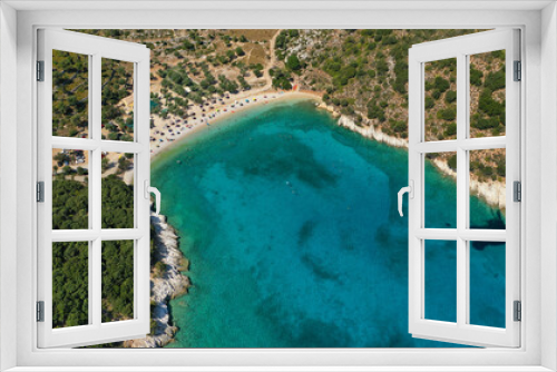 Fototapeta Naklejka Na Ścianę Okno 3D - Aerial drone photo of turquoise paradise sandy beach and bay of Filatro a safe sail boat anchorage in Ithaki or Ithaca island, Ionian, Greece