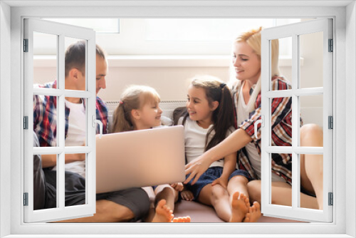 Animated family buying online lying down on bed at home