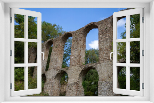 Fototapeta Naklejka Na Ścianę Okno 3D - The 17th century aqueduct of Monterano Natural Reserve.A ghost medieval city in the country of Lazio region province of Rome,Monterano, born in Etruscan times on top of a small tuff hill,Italy