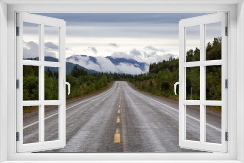 Fototapeta Naklejka Na Ścianę Okno 3D - Beautiful View of a scenic road in the Northern Rockies during a sunny and cloudy morning. Taken in British Columbia, Canada. Nature Background