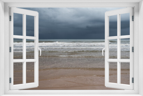 Fototapeta Naklejka Na Ścianę Okno 3D - Storm clouds over the sea.The waves hit to the beach before rainy on seascape background.Bad weather for outdoor travel.