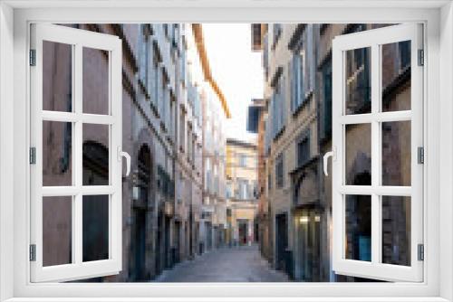 Fototapeta Naklejka Na Ścianę Okno 3D - Narrow alley in tuscan village. antique italian lane, Tuscany, Italy