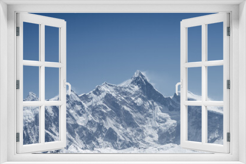 Fototapeta Naklejka Na Ścianę Okno 3D - mountain peak against a blue sky