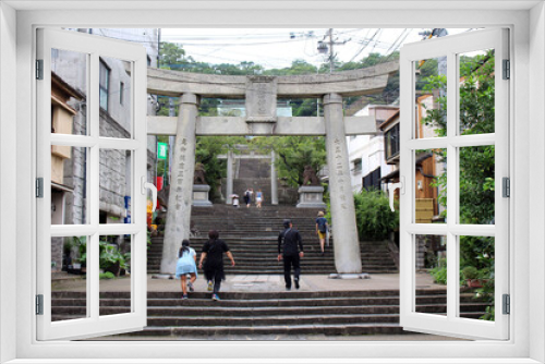 Fototapeta Naklejka Na Ścianę Okno 3D - Entering the entrance gate of Suwa Shrine of Nagasaki from the main street.