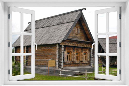 Fototapeta Naklejka Na Ścianę Okno 3D - Traditional russian wooden house in Museum of wooden architecture. Suzdal town, Vladimir Oblast, Russia.