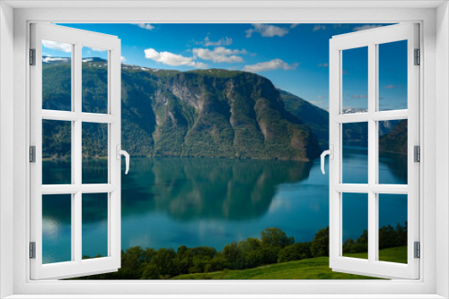 Fototapeta Naklejka Na Ścianę Okno 3D - Breathtaking views of the Aurlandsfjord (a branch off the Sognefjorden) from the Stegastein viewpoint on Sogn og Fjordane County Road 243, Vestland, Norway.