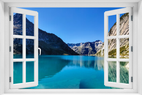 Fototapeta Naklejka Na Ścianę Okno 3D - Gelmersee. Dam in the Swiss alps for Hydro power. Clear Blue lake