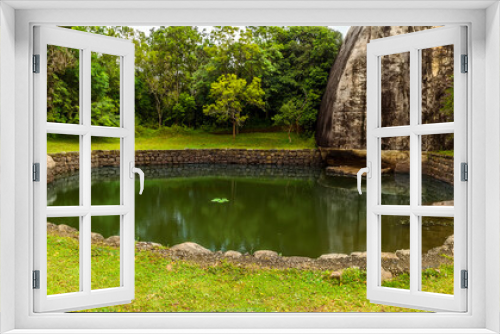 Fototapeta Naklejka Na Ścianę Okno 3D - An octagonal lake in the gardens of the rock fortress of Sigiriya, Sri Lanka