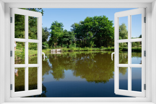 Fototapeta Naklejka Na Ścianę Okno 3D - Romania, Bistrita, Paradisul Verde Guesthouse, pontoon on the lake, 2020