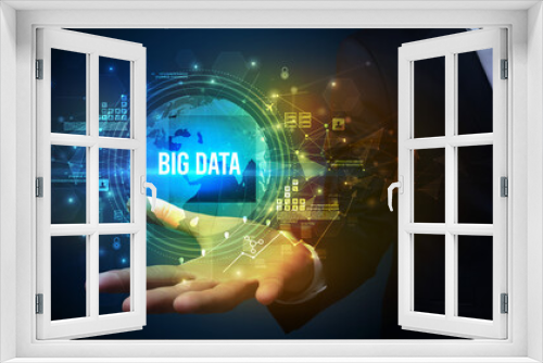 Elegant hand holding BIG DATA inscription, digital technology concept