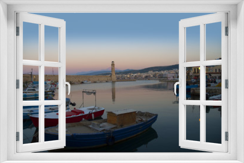 Fototapeta Naklejka Na Ścianę Okno 3D - Sunset over the Venetian Harbour at Rethymno Crete Greece