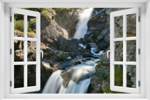 Fototapeta Naklejka Na Ścianę Okno 3D - The Rutor waterfall, in Valle d'Aosta, descends impetuously among the rocks