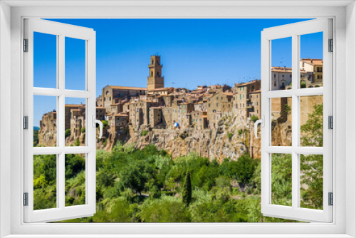 Fototapeta Naklejka Na Ścianę Okno 3D - Pitigliano, Tuscany perched on tuff cliff, Old Town and alleys. Splendid town in the Tufo Area, in the heart of Tuscan Maremma, Pitigliano perched on tuff cliff one of most beautiful villages in Italy