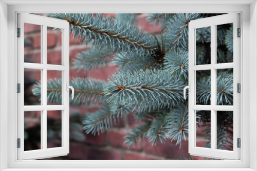 Fototapeta Naklejka Na Ścianę Okno 3D - .Christmas tree with red brick wall