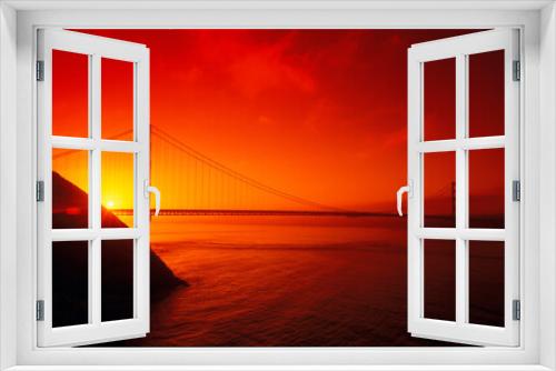 Fototapeta Naklejka Na Ścianę Okno 3D - Silhouette of a suspension bridge at dusk, Golden Gate Bridge, San Francisco, California, USA 