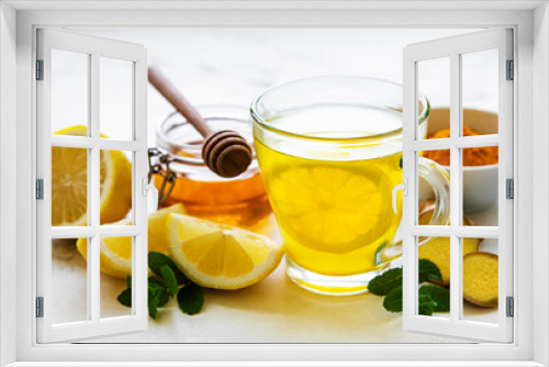 Fototapeta Naklejka Na Ścianę Okno 3D - Energy tonic drink with turmeric, ginger, lemon and honey