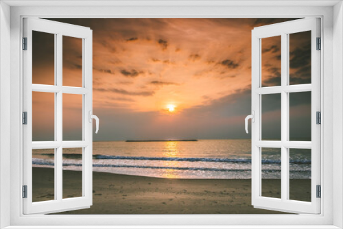 Fototapeta Naklejka Na Ścianę Okno 3D - Beautiful golden sunset with blue sky over the horizon on the beach background, Thailand. Tropical twilight colorful sunrise from the landscape sea. Summer ocean vacation concept.