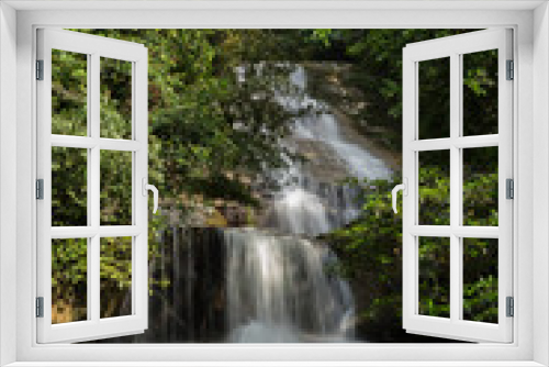 Fototapeta Naklejka Na Ścianę Okno 3D - Beautiful rainforest waterfall in slow shutter mode.