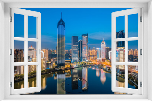 Fototapeta Naklejka Na Ścianę Okno 3D - Night view of CBD buildings in Northwest Lake, Hankou, Wuhan, Hubei, China