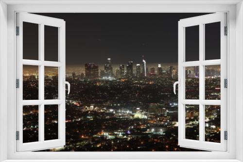 Fototapeta Naklejka Na Ścianę Okno 3D - Night view of Downtown Los Angeles skyline seen from Observatory in California, USA