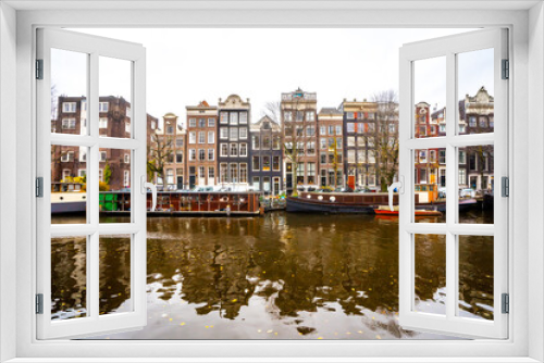 Fototapeta Naklejka Na Ścianę Okno 3D - Nice buildings around canal  in Amsterdam , Netherlands - 26 November